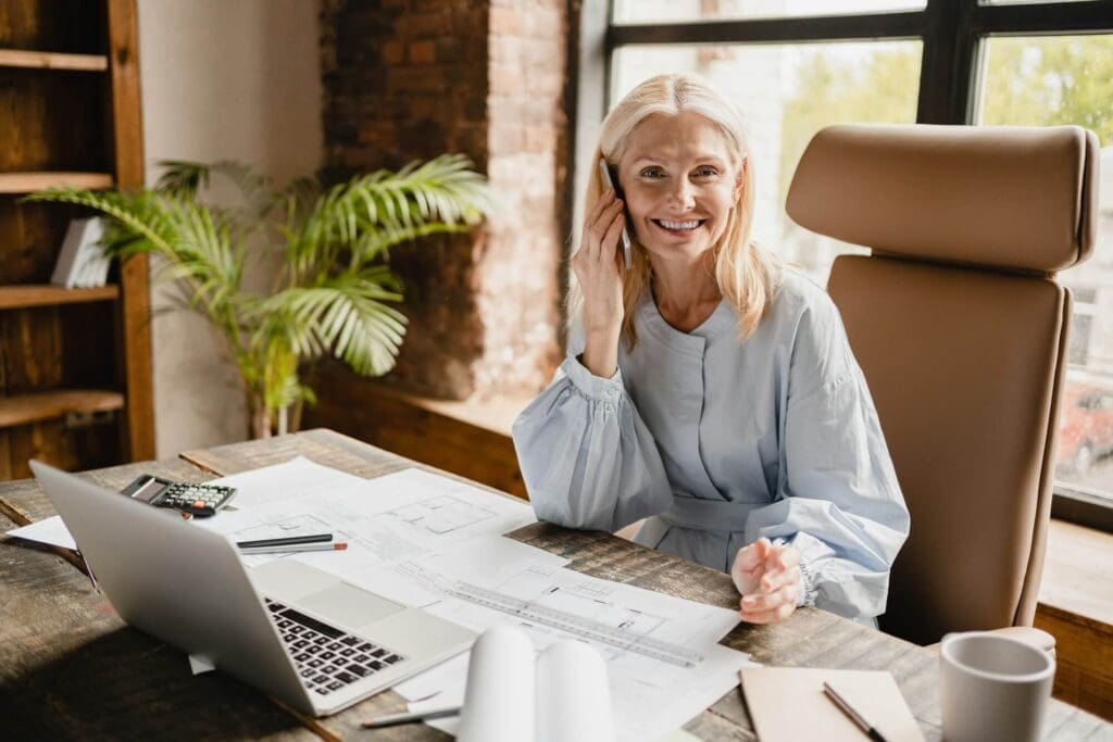 engineer talking on smartphone with clients boss working on architectural plans drawing projects Garage Doors Perth 17 engineer talking on smartphone with clients boss working on architectural plans drawing projects Garage Doors Perth 16