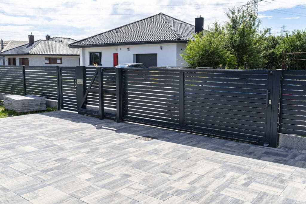 a modern panel fence in anthracite color a visibl 2025 03 12 21 10 45 utc Automatic Gates 6 a modern panel fence in anthracite color a visibl 2025 03 12 21 10 45 utc Automatic Gates 5